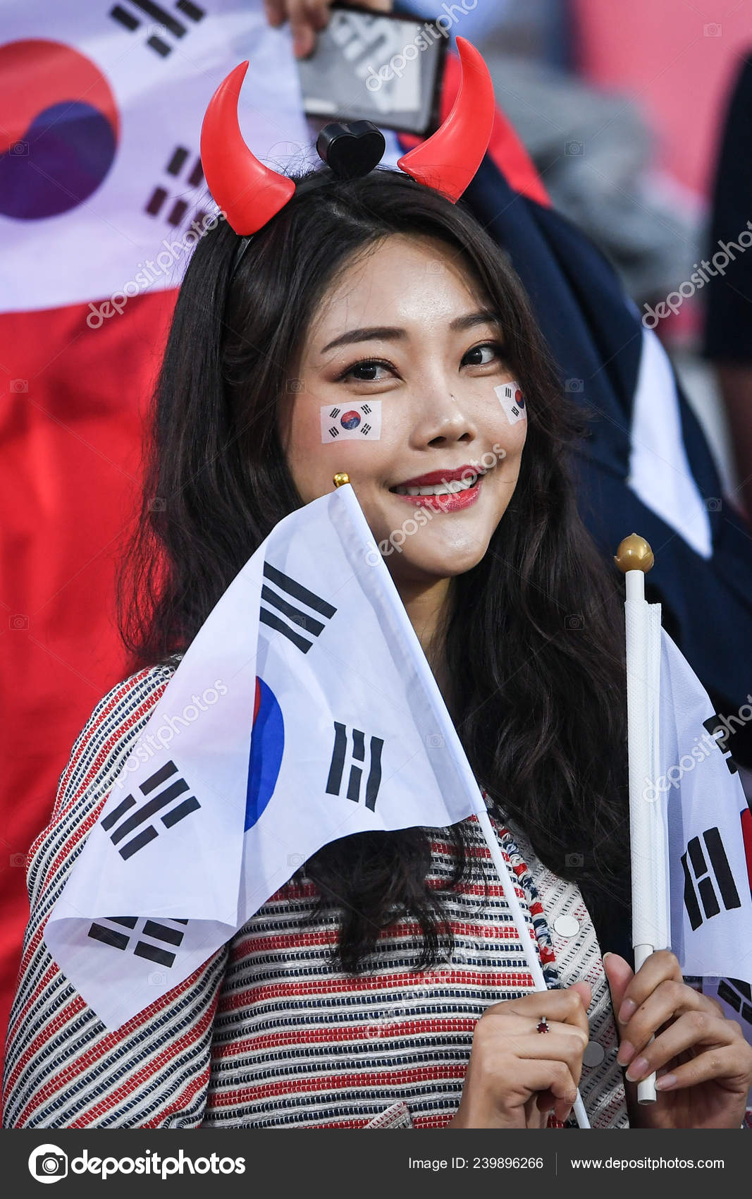 depositphotos_239896266-stock-photo-south-korean-football-fan-shows.jpg